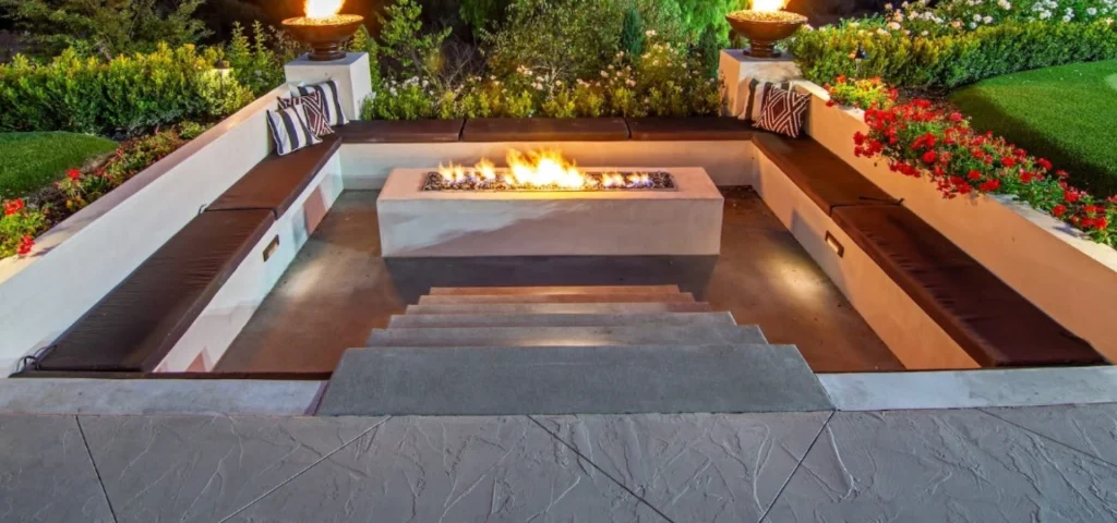 Outdoor residential fire pit installed by Teserra Outdoors