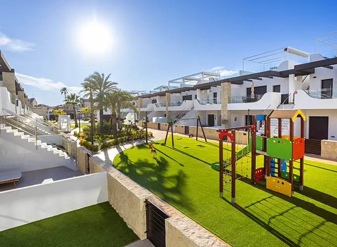 Artificial grass playground installed by Teserra Outdoors