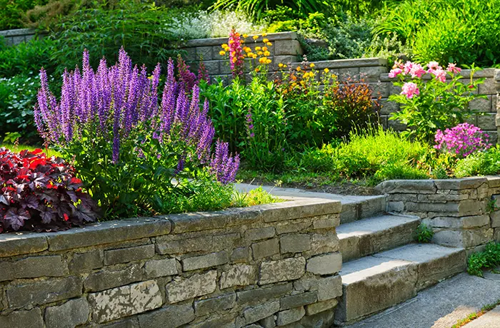 Outdoor retaining wall installation from Teserra Outdoors