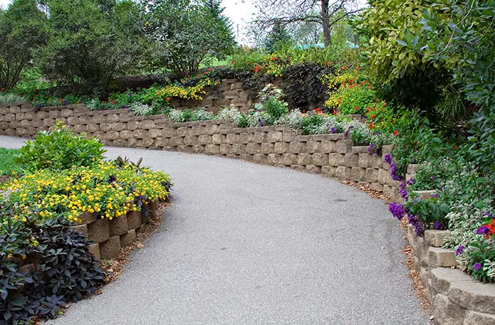 Outdoor retaining wall installation from Teserra Outdoors